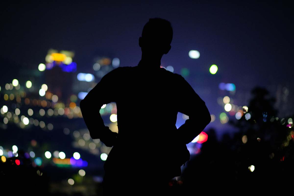 leisure activities person standing behind lights music